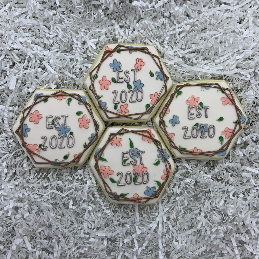 Hexagon cookies with piped flowers and EST 2020